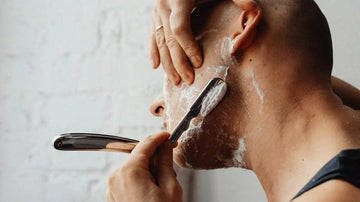 Man scheren open scheermes